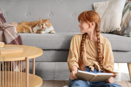 Teenage redhead girl with c...