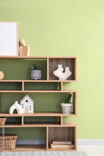 Bookshelf with plants and d...