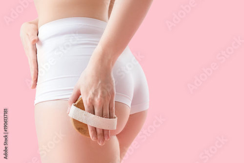 Young woman in underwear ma...
