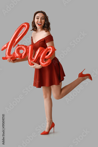 Happy young woman with air ...