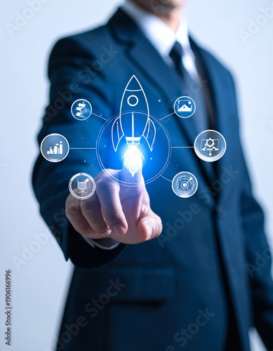 Businessman touching a glowing rocket icon surrounded by other business and technology symbols, representing startup, innovation, and digital transformation.