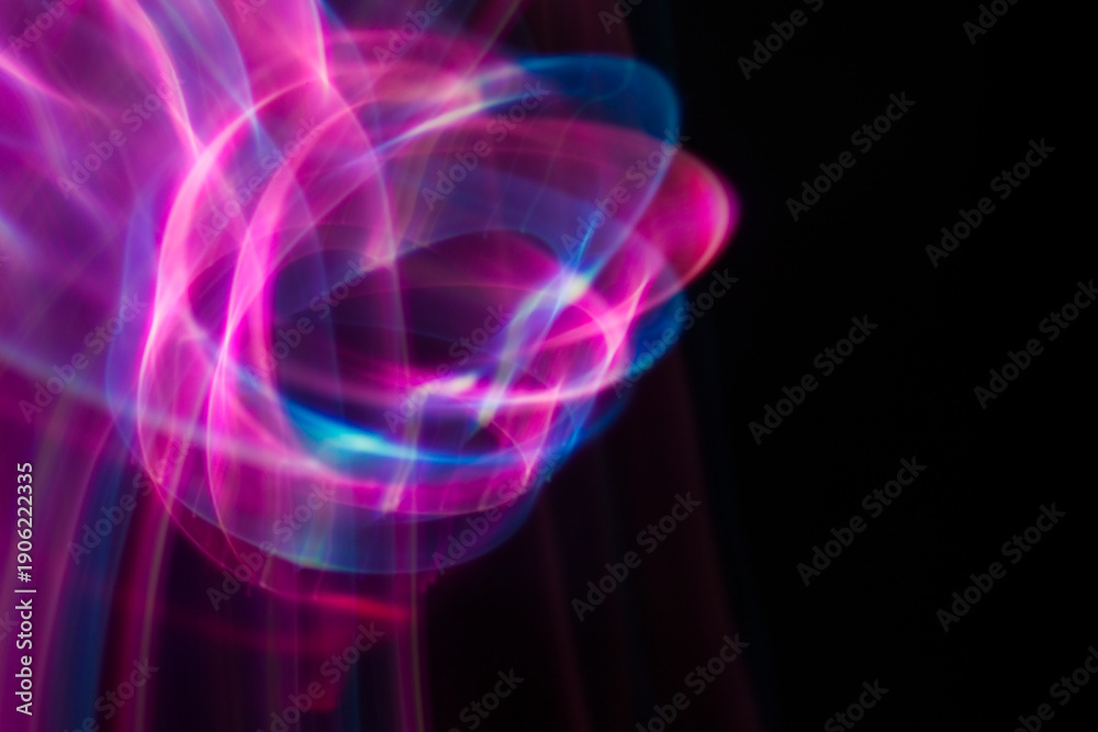 Obraz premium Dynamic Neon Light Streaks Abstract Background