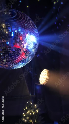 Christmas Disco Ball rotating nightclub radiating sparkling rays