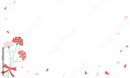 リボンで束ねられたカーネーションの花束と花びらが舞うフレーム