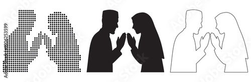 Couple greeting with hands together in a gesture of respect and tradition