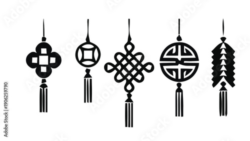 Five traditional Chinese knot ornaments with tassels hang against a white background.
