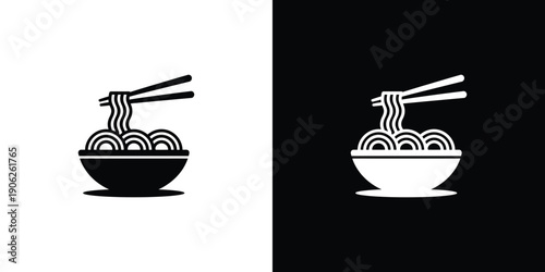Black and white bowl of noodles with chopsticks