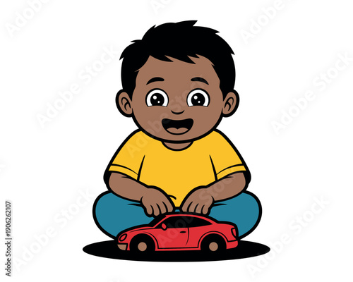 A happy young boy sitting cross-legged with a red toy car