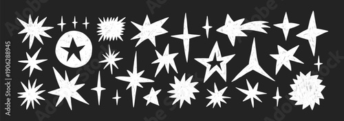 Crayon star, hand drawn pencil or brush doodle illustration. Crayon twinkle, blink, firework, glitter silhouette and glowing symbols on a blackboard.