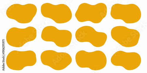 Abstract arrangement of golden yellow amoeba like shapes against a white background