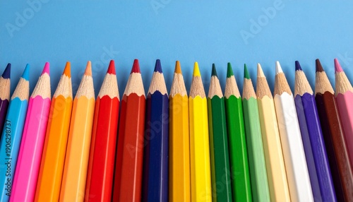 Wallpaper Mural Vibrant Row of Sharpened Color Pencils on a Blue Background. Torontodigital.ca
