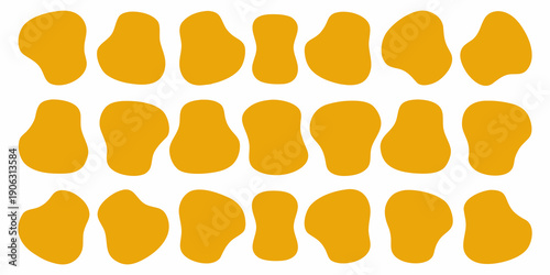 Abstract arrangement of irregular rounded golden shapes on white