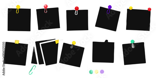 Colorful push pins attached to black sticky notes on a dark background