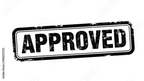 Approved Stamp of Authority: A worn, rectangular stamp boldly displays the word APPROVED, conveying a sense of authorization, validation, and official endorsement.