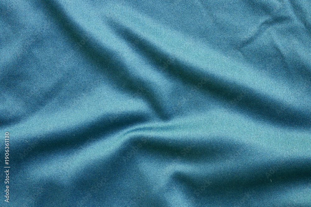 Fototapeta premium Blue sports clothing fabric football shirt jersey texture close up