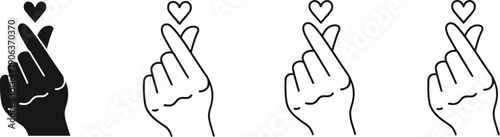 Korean finger heart gesture, a popular symbol of love and affection.  "I love you" K-pop culture finger hearts. Overlapping the thumb and index finger to form a small heart shape. 