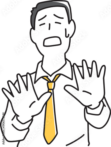 困った顔で否定する男性社員