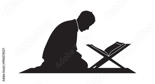 Man Praying with Quran on Rehal in Meditation Silhouette