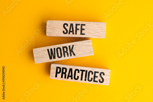 Wooden block with the words safe work practices