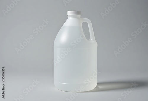 Large translucent plastic jug with handle and spout for liquid storage. 1 gallon jug