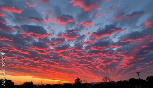 Vivid Sunset with Cloudscape and Silhouettes Dusk