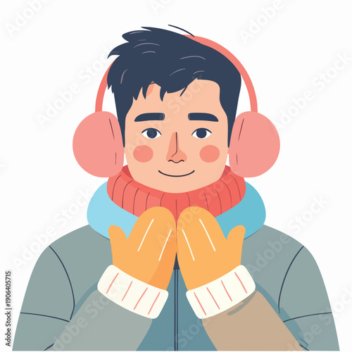 Man wearing warm winter clothing and earmuffs smiles while warming hands together