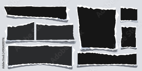 Collection of torn paper scraps with jagged edges on a gray background