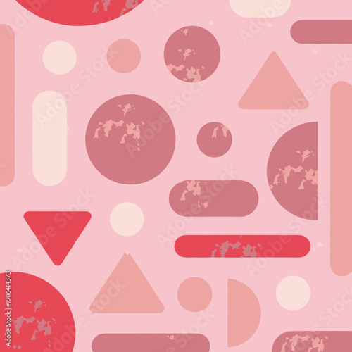 Geometric shapes in various red shades arranged in a visually appealing pattern on a soft pink background viewed from directly above