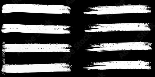 Abstract white brush strokes on a black background