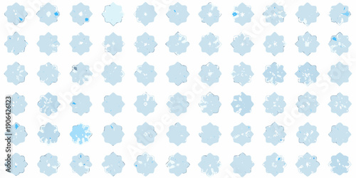 A repeating pattern of light blue abstract snowflake like shapes