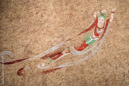 The ancient figure murals of the Dunhuang Caves in China.