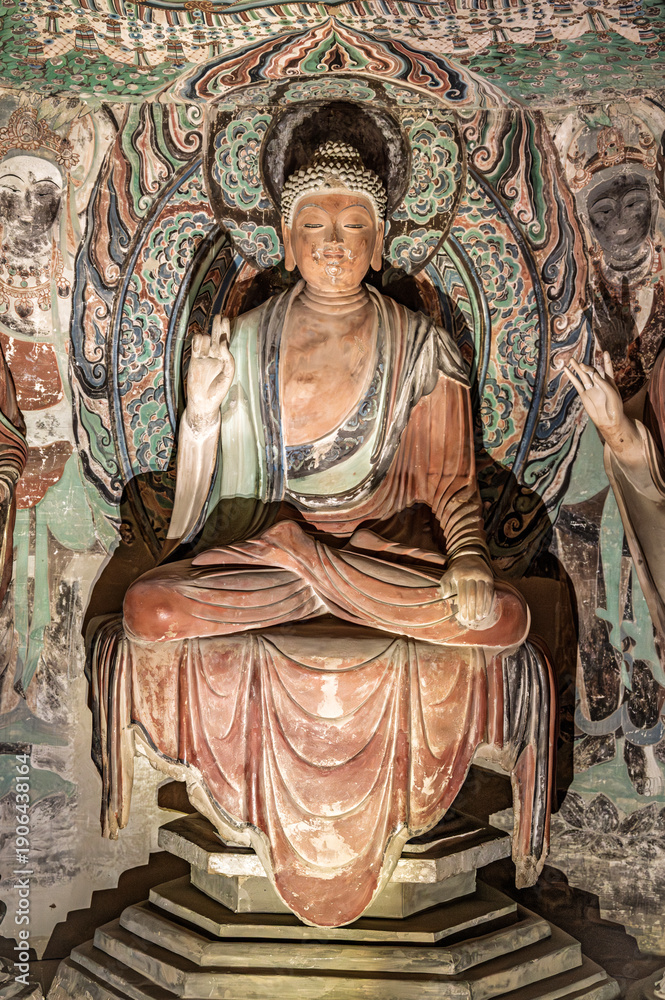 Naklejka premium Ancient Bodhisattva statues in the Dunhuang Caves, China