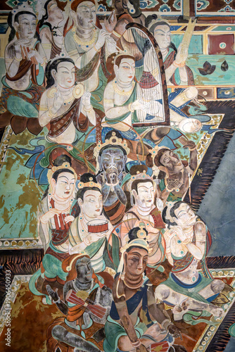 Ancient mythological story characters murals in the Dunhuang Caves of China.