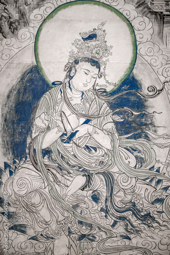 Ancient immortal murals in the Dunhuang Caves of China.