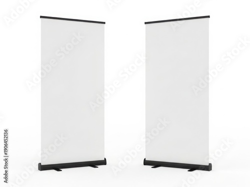 Two empty roll-up banners standing side by side against a white background