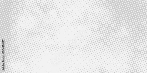 Minimalist monochrome halftone pattern featuring scattered dots in soft gray tones, ideal for contemporary backgrounds and layouts.