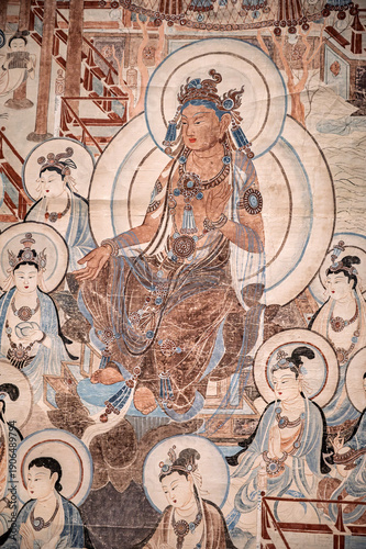 A close-up of the ancient Buddhist mural in the Mogao Caves of Dunhuang, China.
