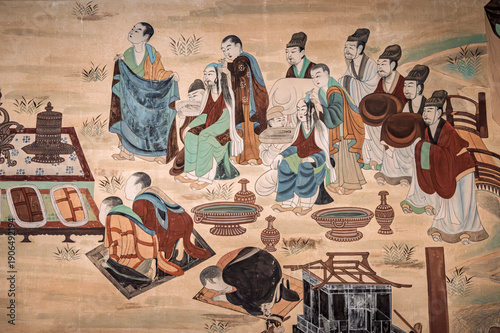 Ancient mythological story characters murals in the Dunhuang Caves of China.