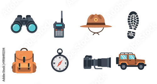 Essential equipment for wilderness adventure and safari exploration including binoculars, a radio, a compass, and a camera, perfect for travel blogs and outdoor guides
