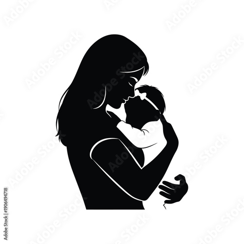 Silhouette of a mother holding her baby