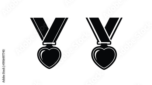 Two heart shaped medals displayed a striking black silhouette