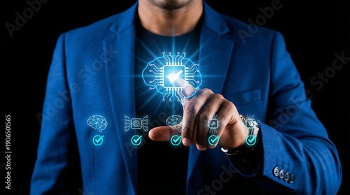 Man in a blue suit points his index finger at a glowing virtual screen, triggering blue icons and a play button on a black background, close view