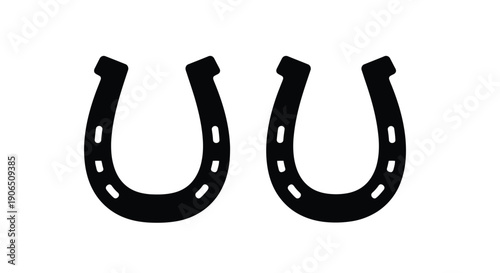 Two black horseshoes displayed against a white background silhouette