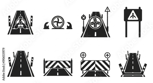 Collection of road signs and traffic control elements.