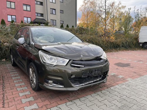Wallpaper Mural Abandoned damaged car on residential parking space Torontodigital.ca