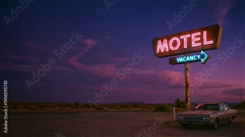 Glowing neon motel vacancy sign at dusk with an antique car in the foreground. Retro travel and road trip concept for vintage design