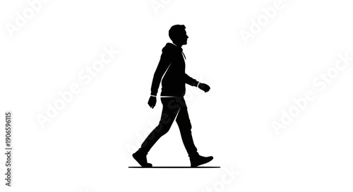 Silhouette of a man walking forward in a casual pose.