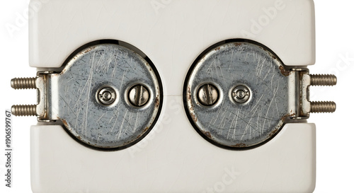 Two small old silver potentiometers with pins mounted on a white plastic base, close-up isolated on transparent background