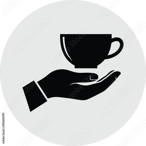 A hand holding a cup of coffee