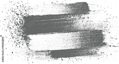 Gray paint brush strokes and splatter on white background